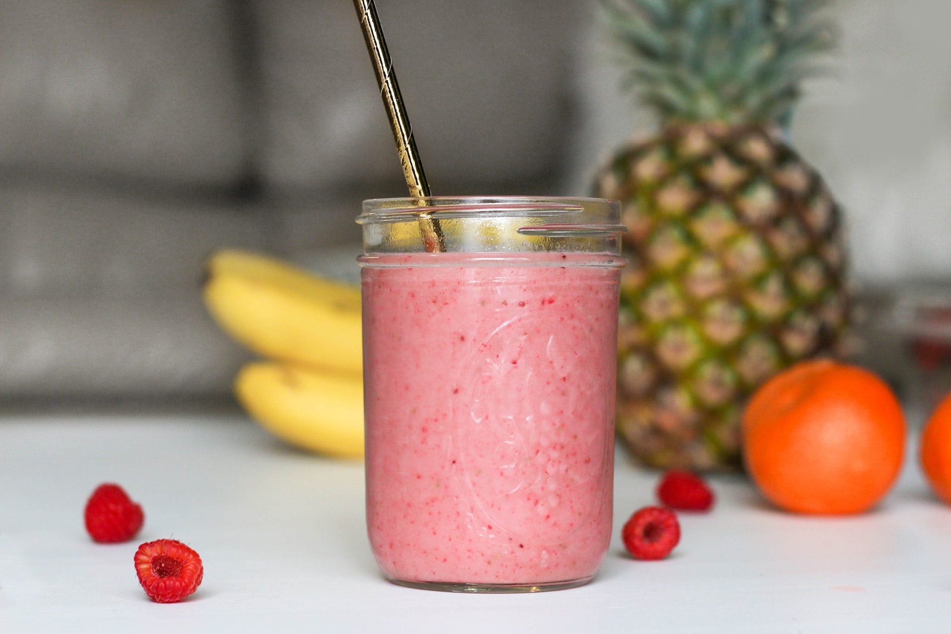 Citrus berry smoothie in a jar